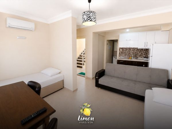 limon-pansiyon-apart-burhaniye-odalarimiz-101-Balkonlu-Standart-Oda3